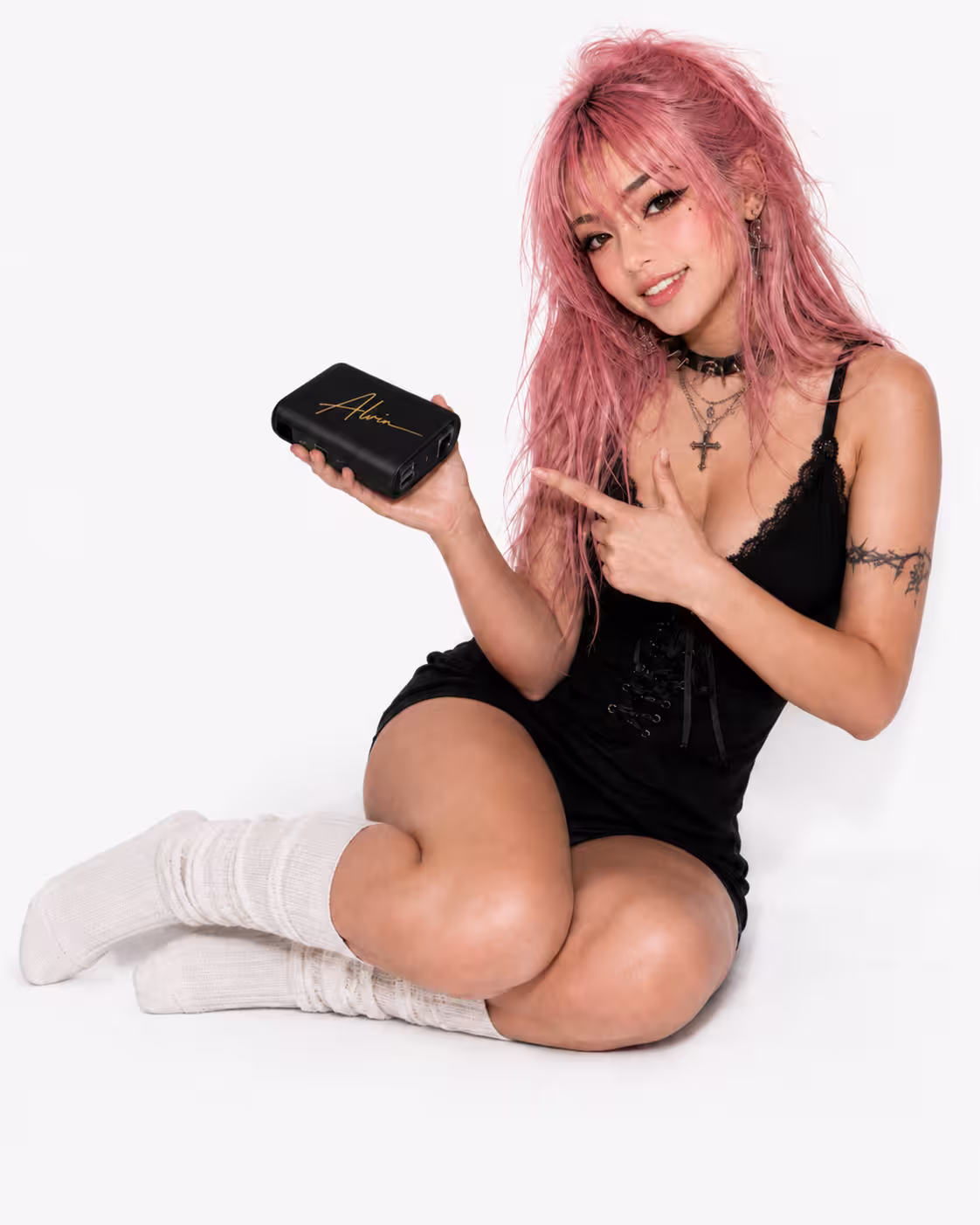 Janxsy holding the ALVIN streaming device